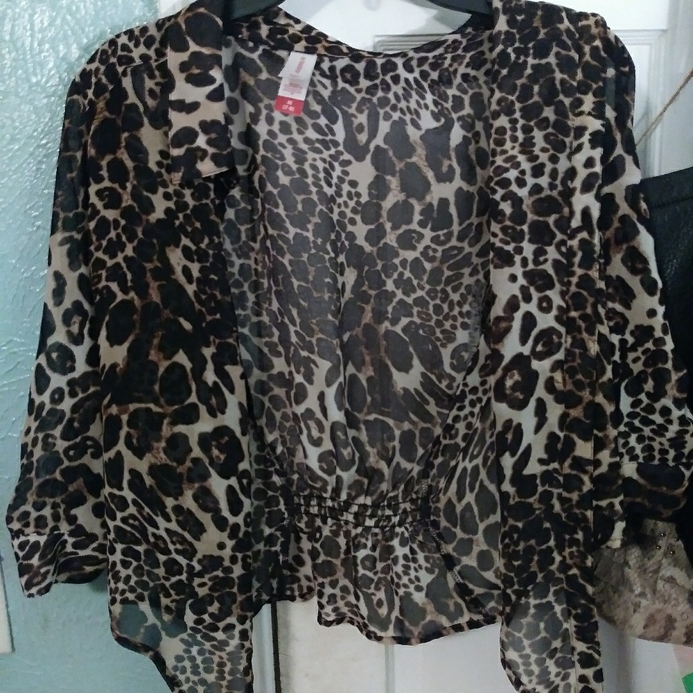 Cheetah shirt.
