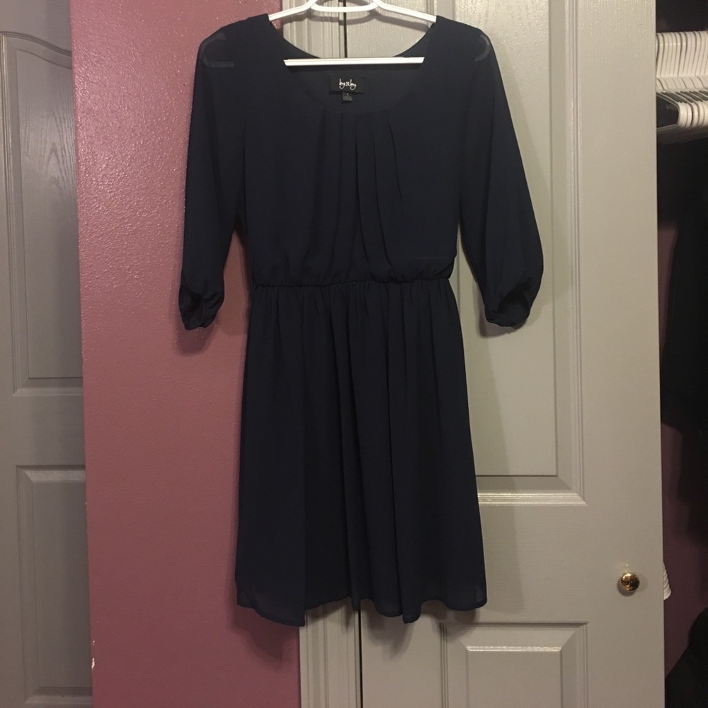 Navy blue dress with pleats