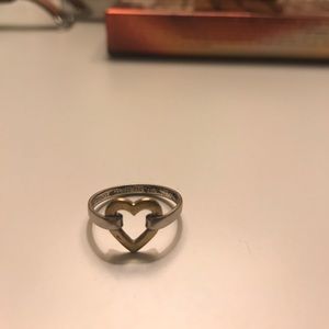 Tiffany heart ring.  I think size 6 or 7