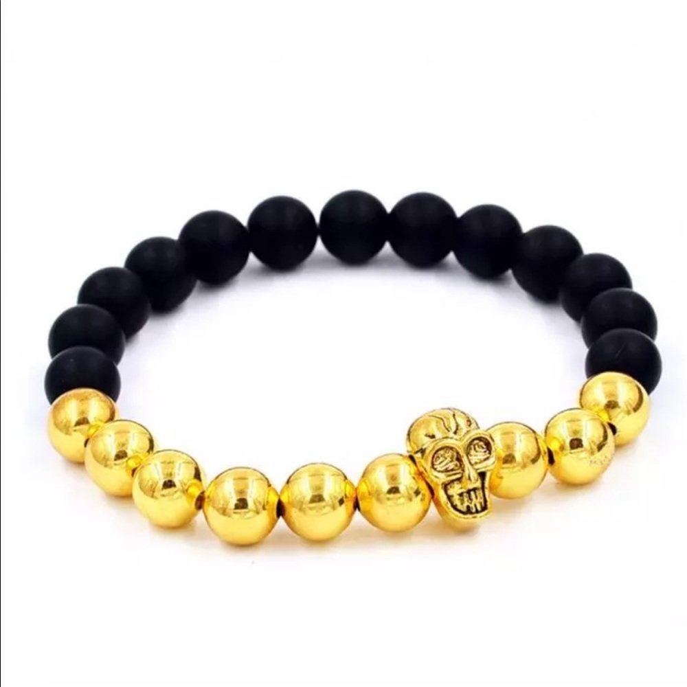 5/$25 gold skull head bracelet black beads