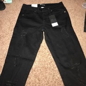 Ripped black stretchy jeans size 5
