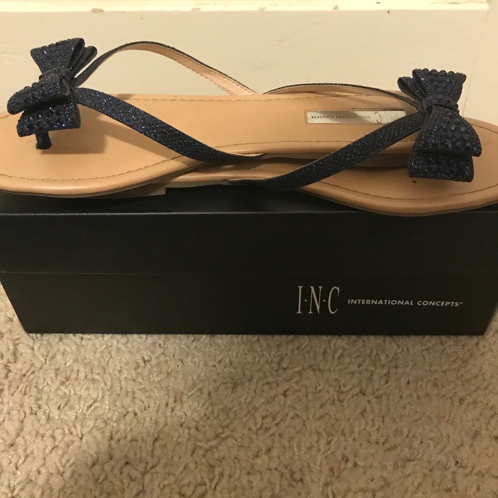Blue bow flip flops