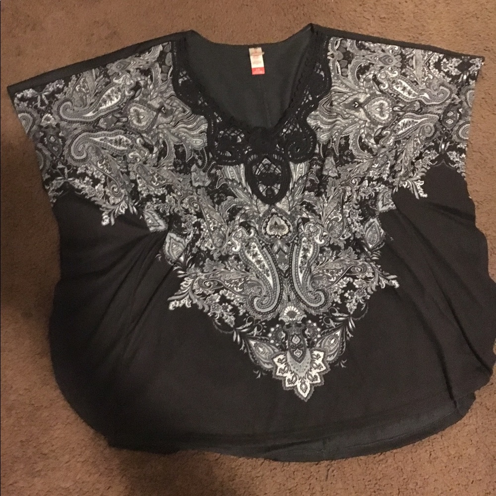 Black winged blouse with beautiful design on front
