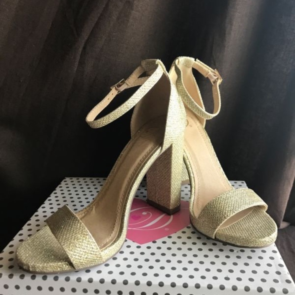 Gold high heels