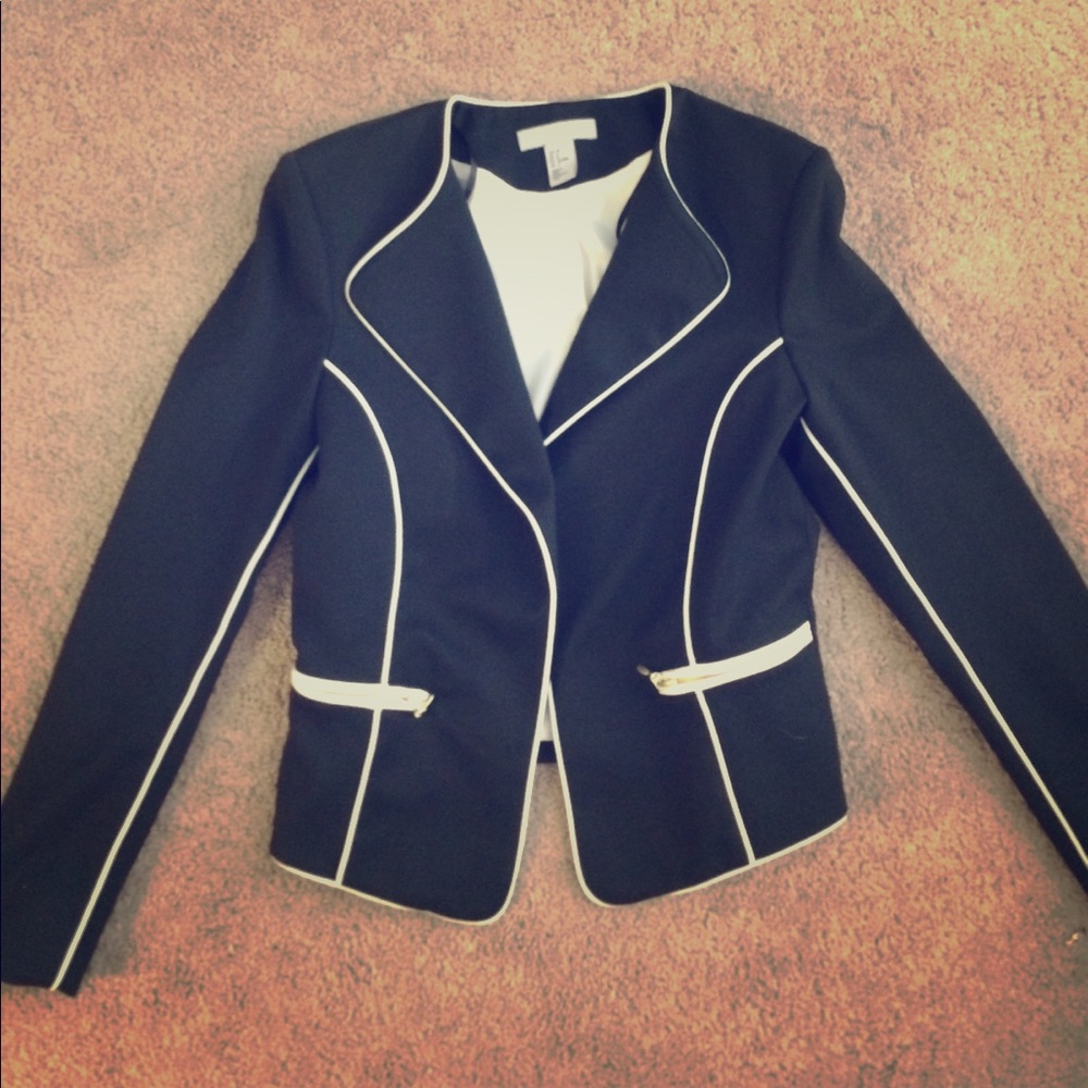 Black open style blazer with white trim