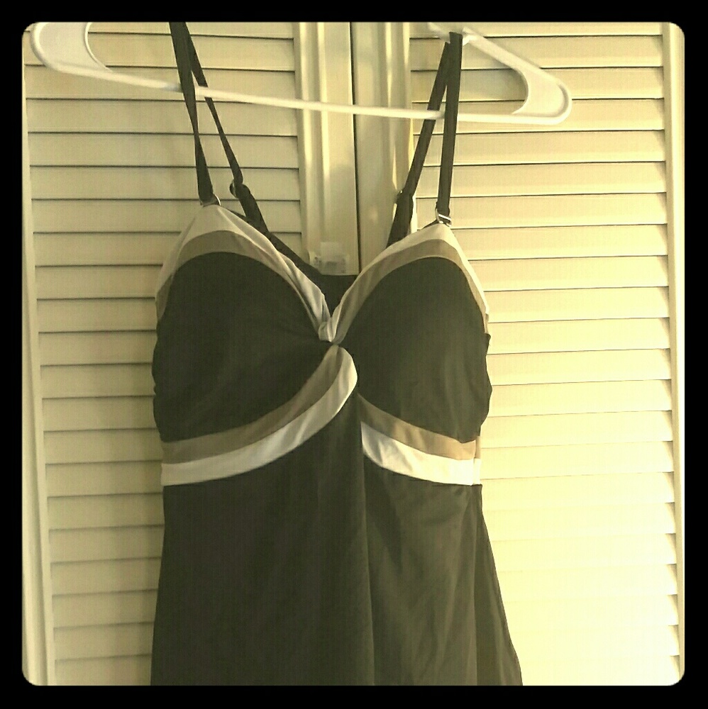 Black tan and white one piece swim suit