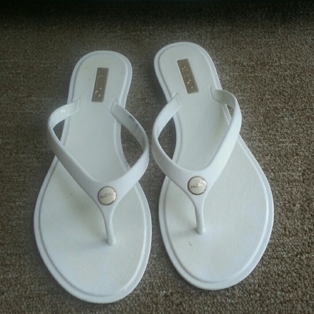 All white Aldo slippers size 7.5 used