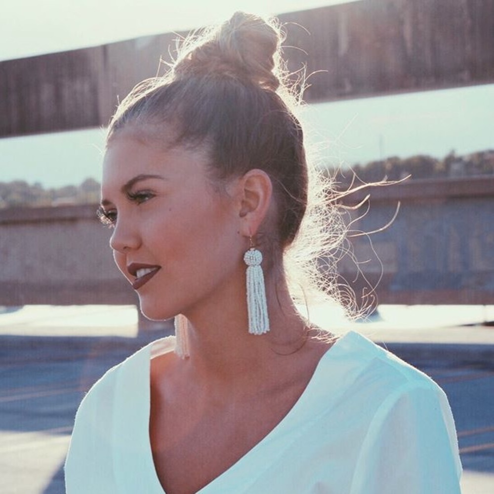 White tassel earrings
