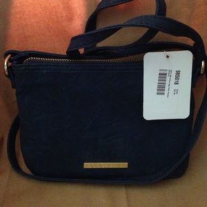 navy blue BCBGeneration crossbody .