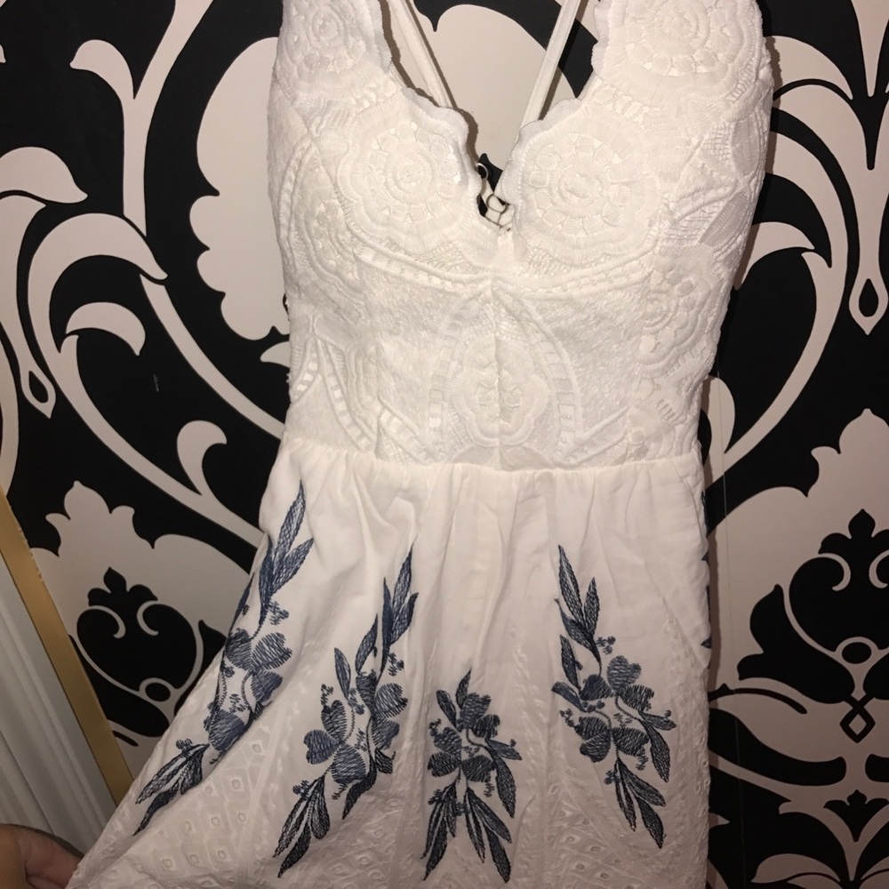 white and navy romper