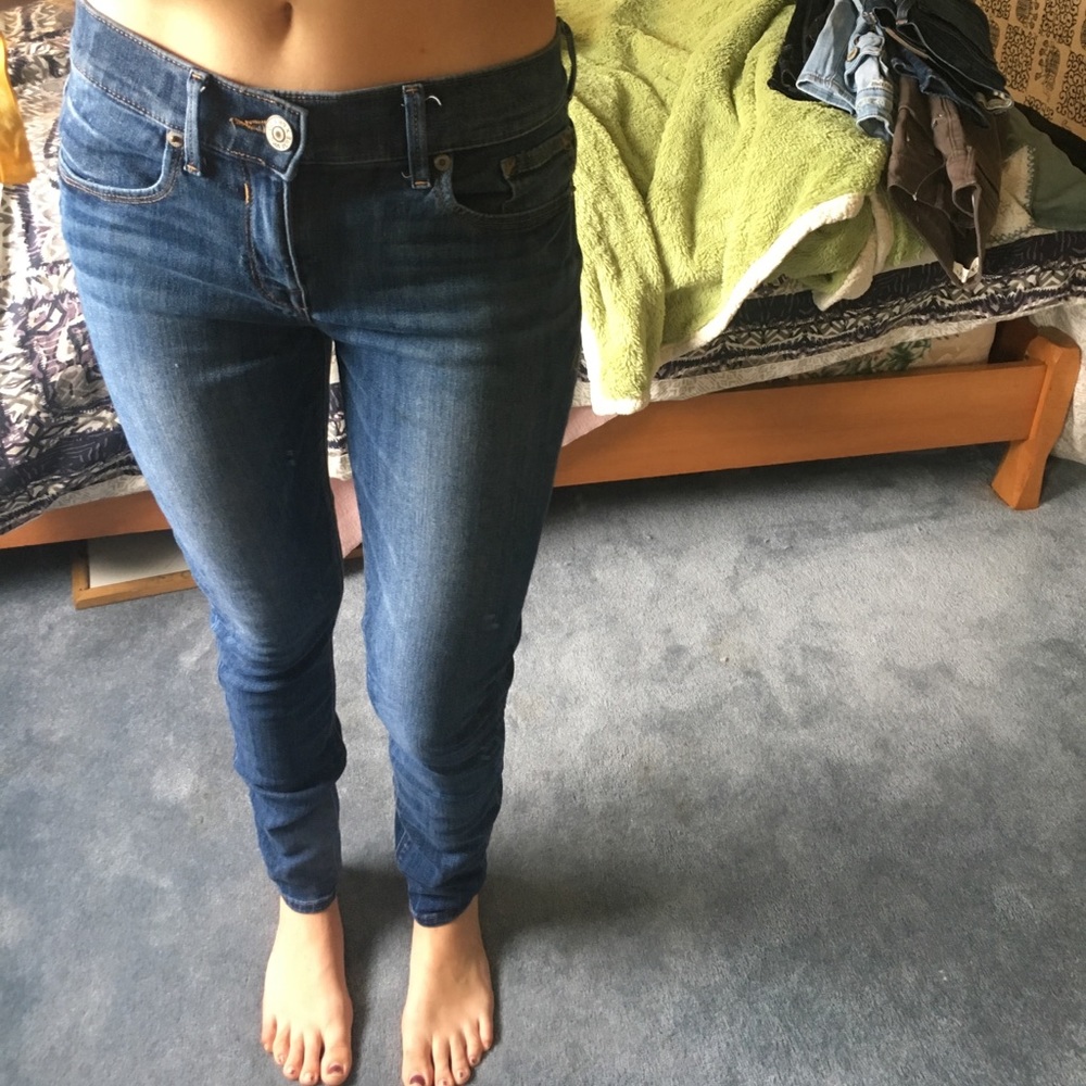 Express medium wash mid rise jean legging