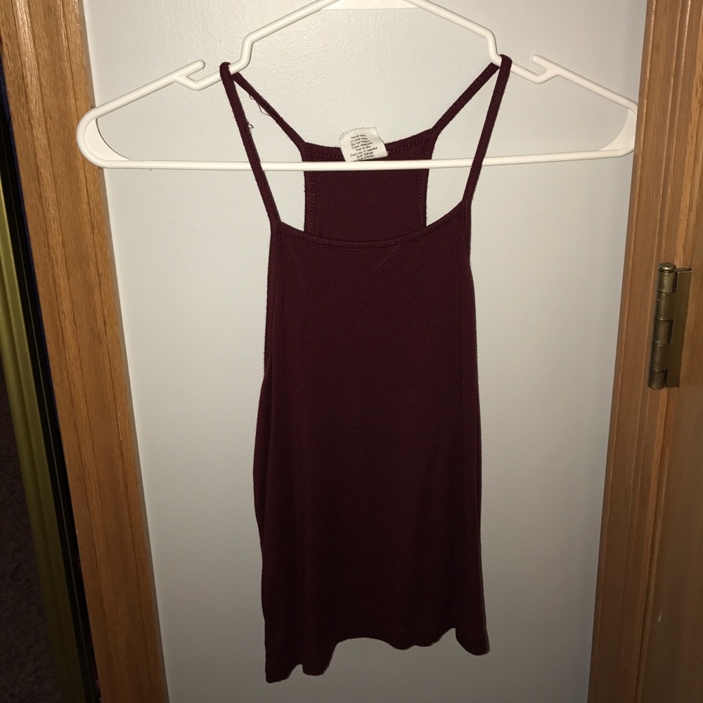 maroon tank top.