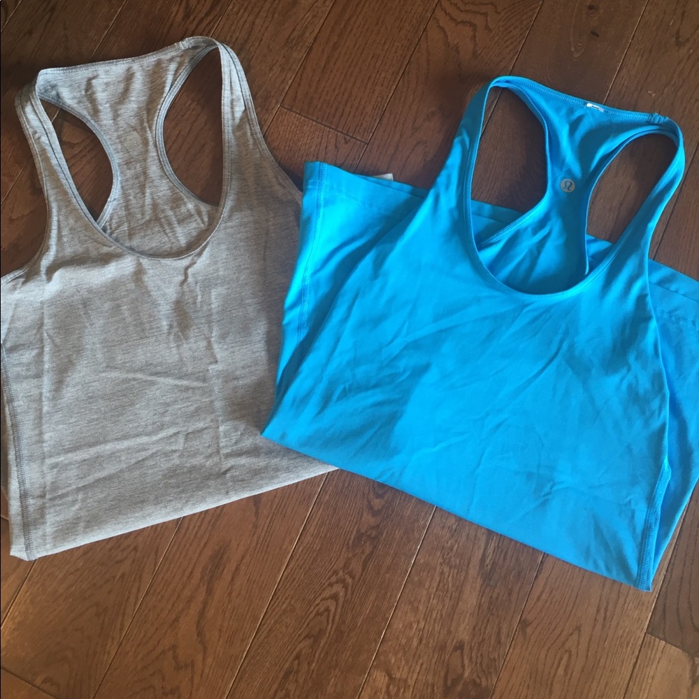 Two Lululemon razorback tank tops