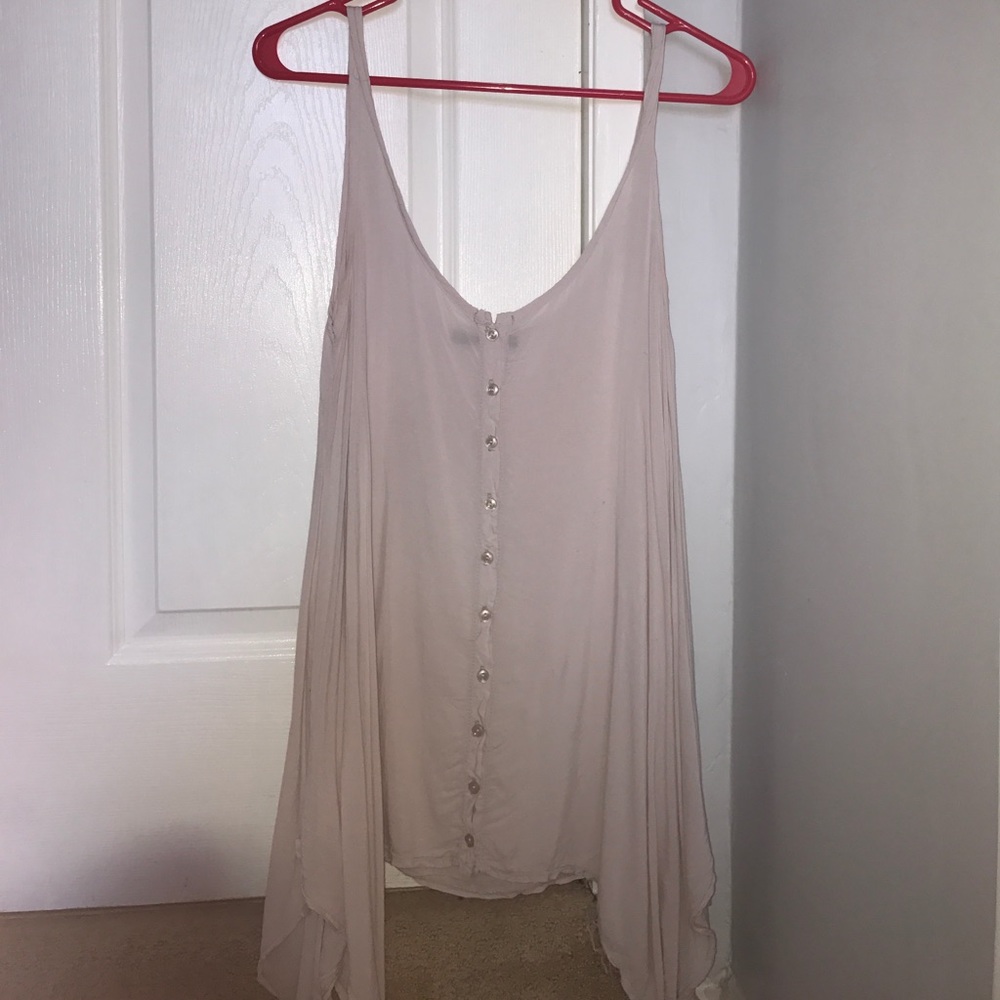 Loose-fit pink tunic top from Brandy Melville.