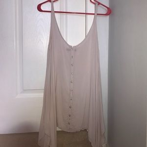 Loose-fit pink tunic top from Brandy Melville.