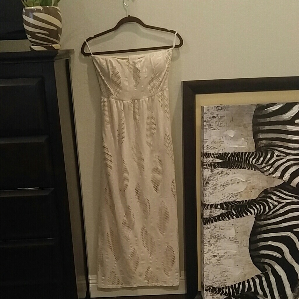 Strapless, intricately designed dress