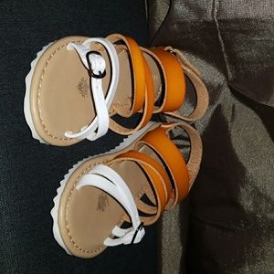 Brown and white toddler sandals