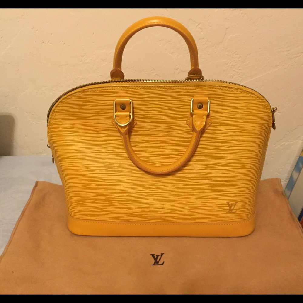 SOLD Authentic LV Epi Alma