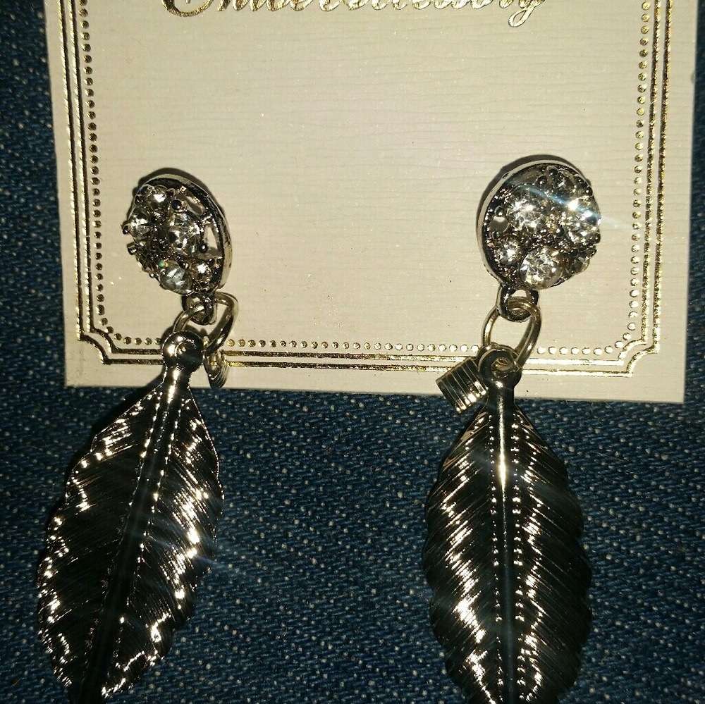 Sparkly studs with dangling feathers
