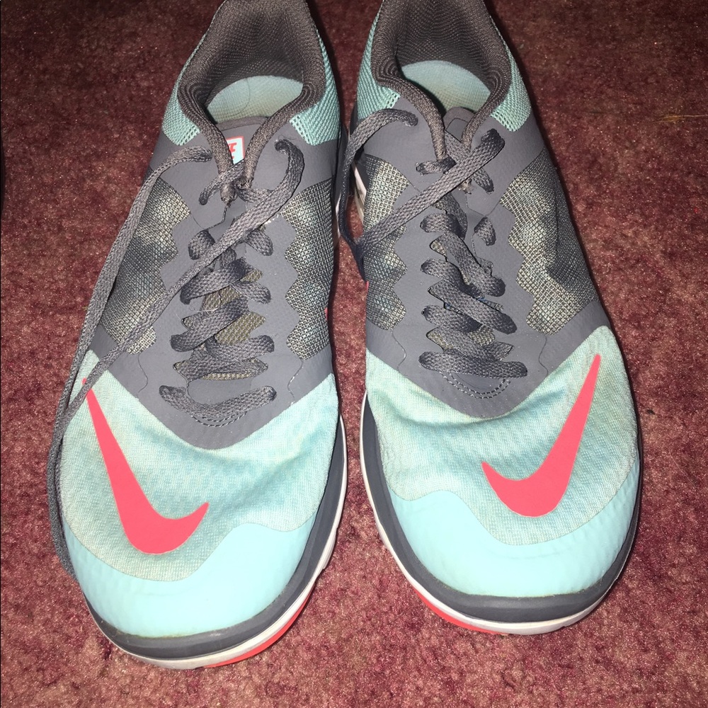 Aqua & orange Nikes.