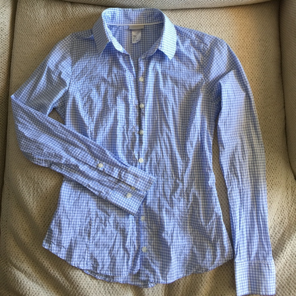 H&M button up blue shirt. Size 2. Brand new