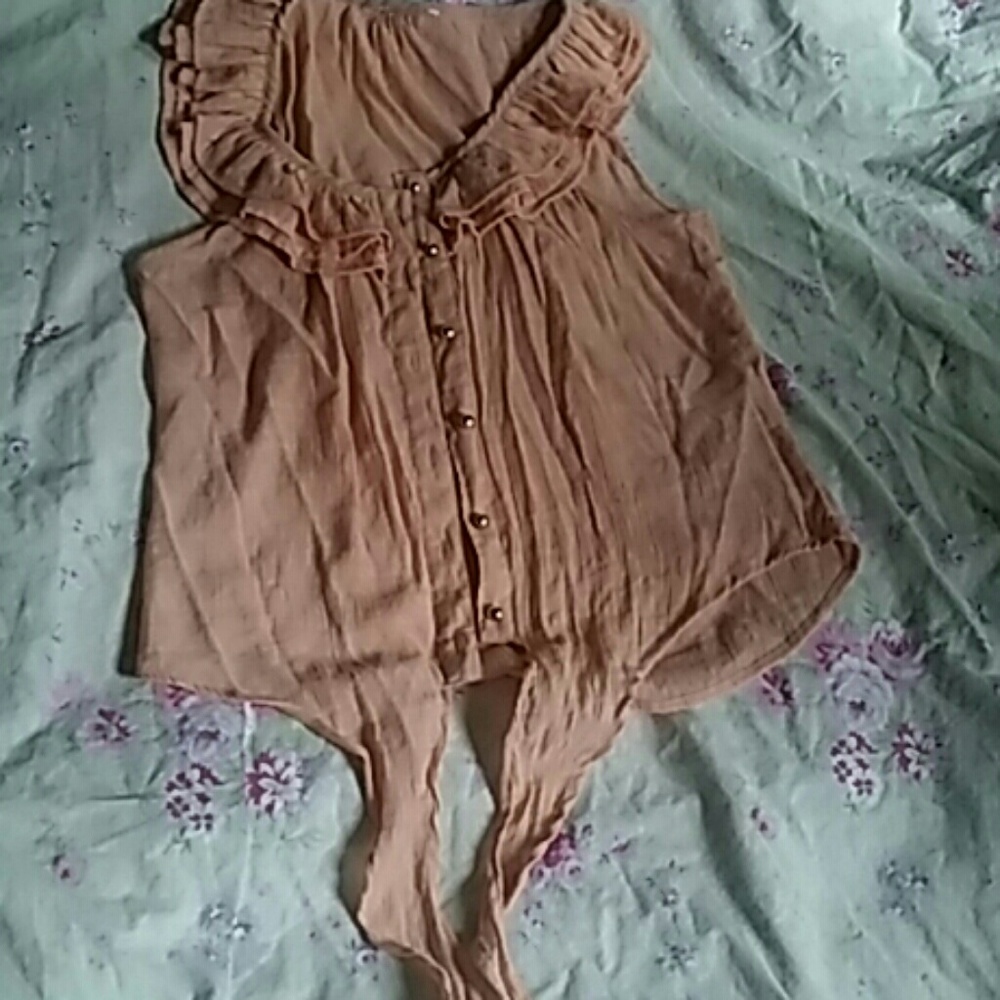 Guazey..sheer..sleeveless front tie top!