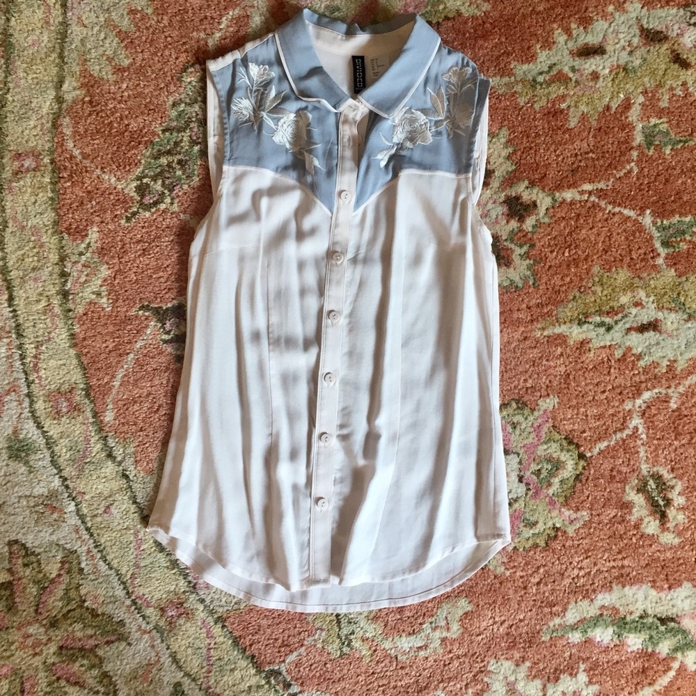 Sleeveless too with embroidered flowers