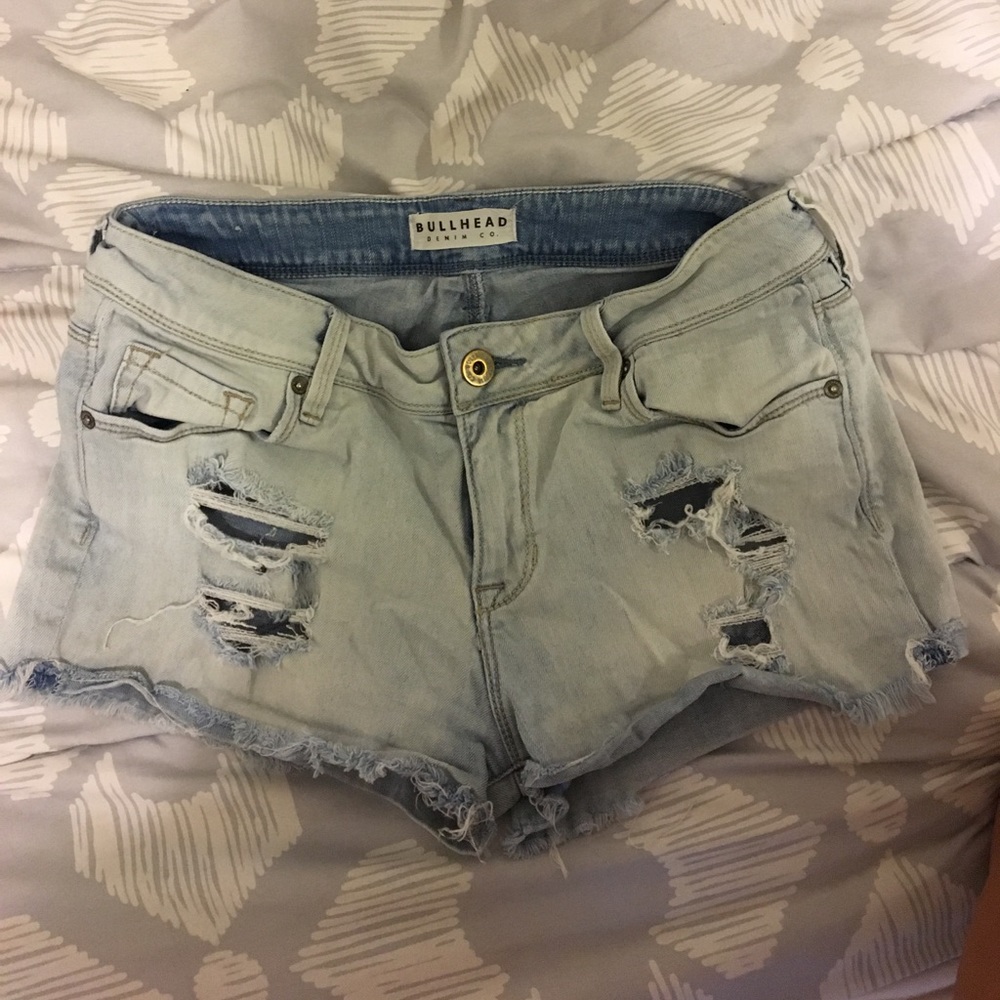 Light wash destroyed denim shorts