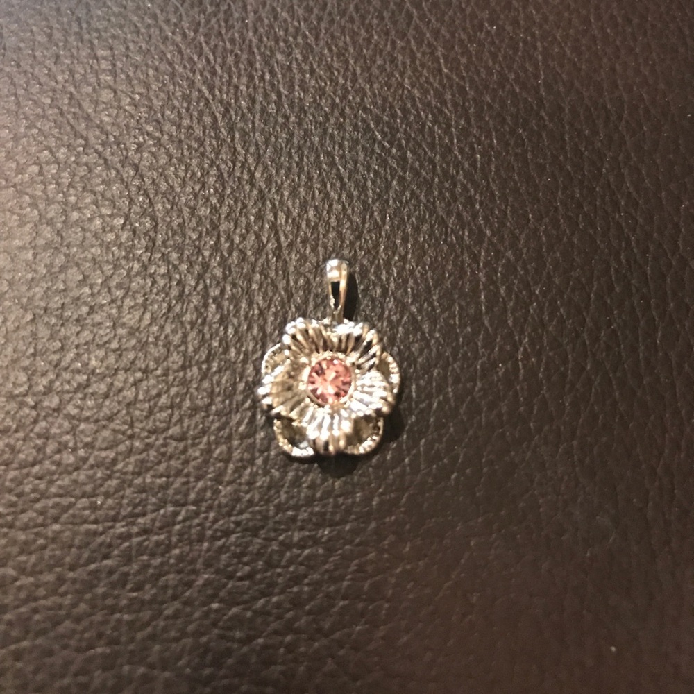 Silver pendant with pink stone