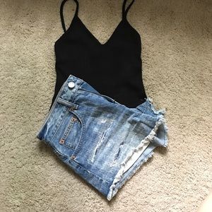 Medium wash AE high rise festival shorts