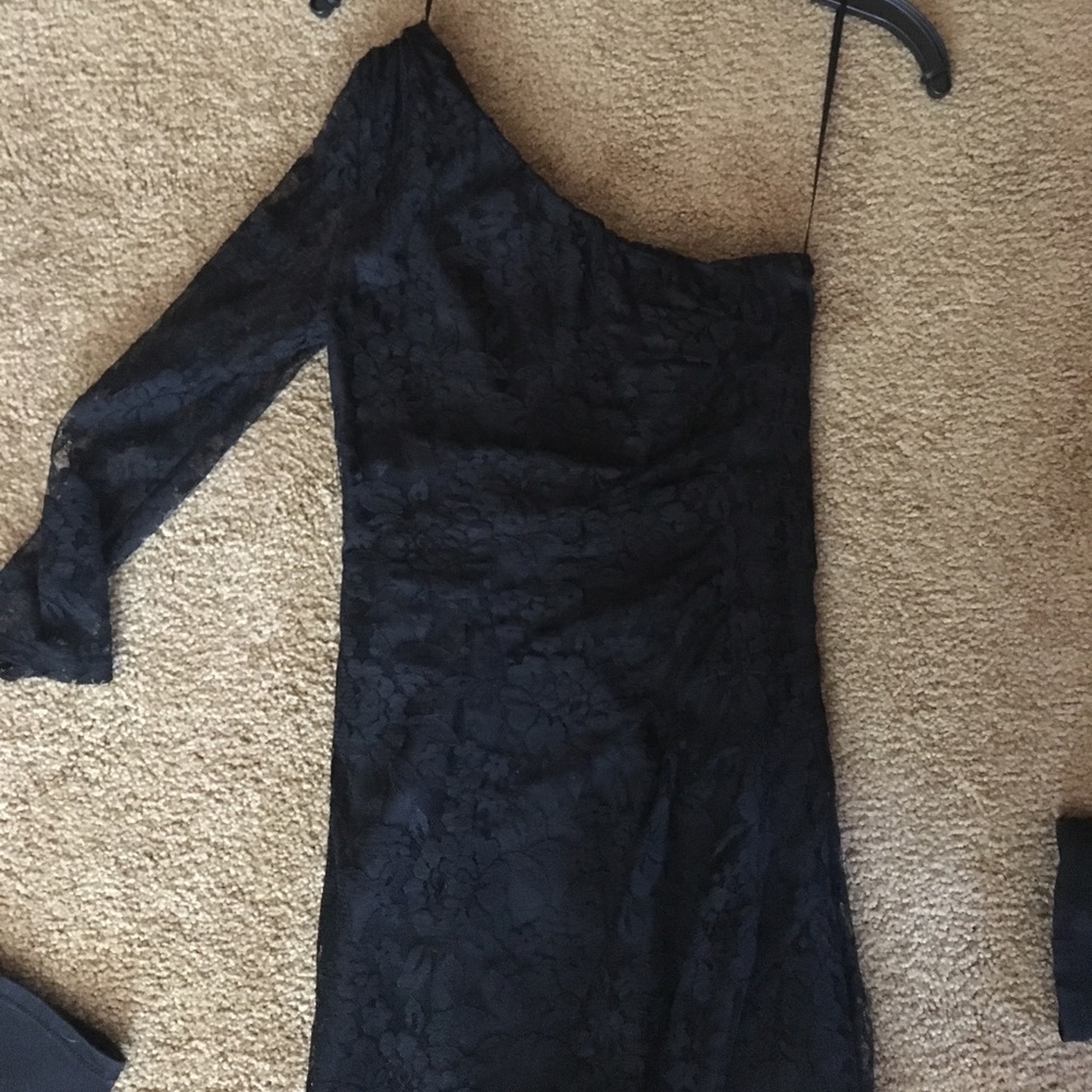 One sleeved black dress