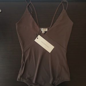 Dance & Marvel strappy / caged brown bodysuit