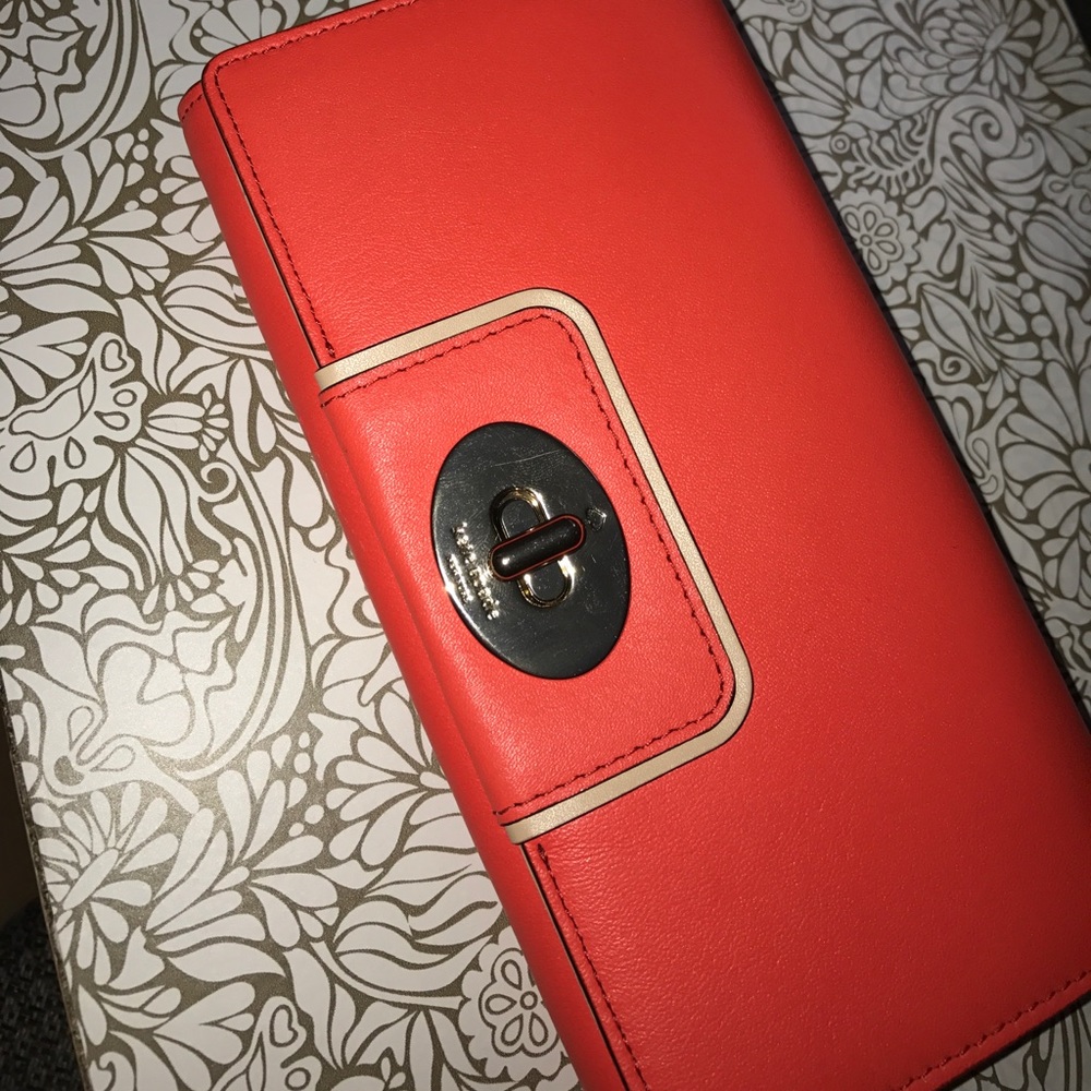 Orange Kate Spade Wristlet Wallet