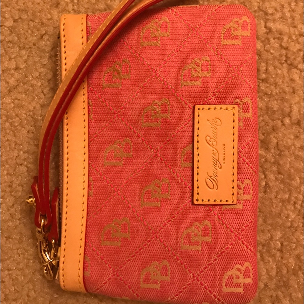 NEVER USED Dooney & Bourke pink wristlet.