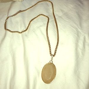 Gold necklace with Beige stone