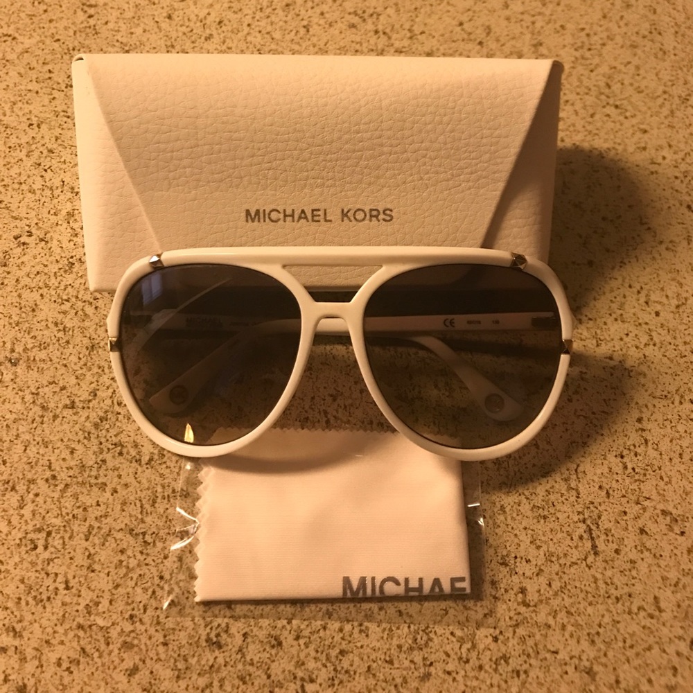 MK sunglasses and case.
