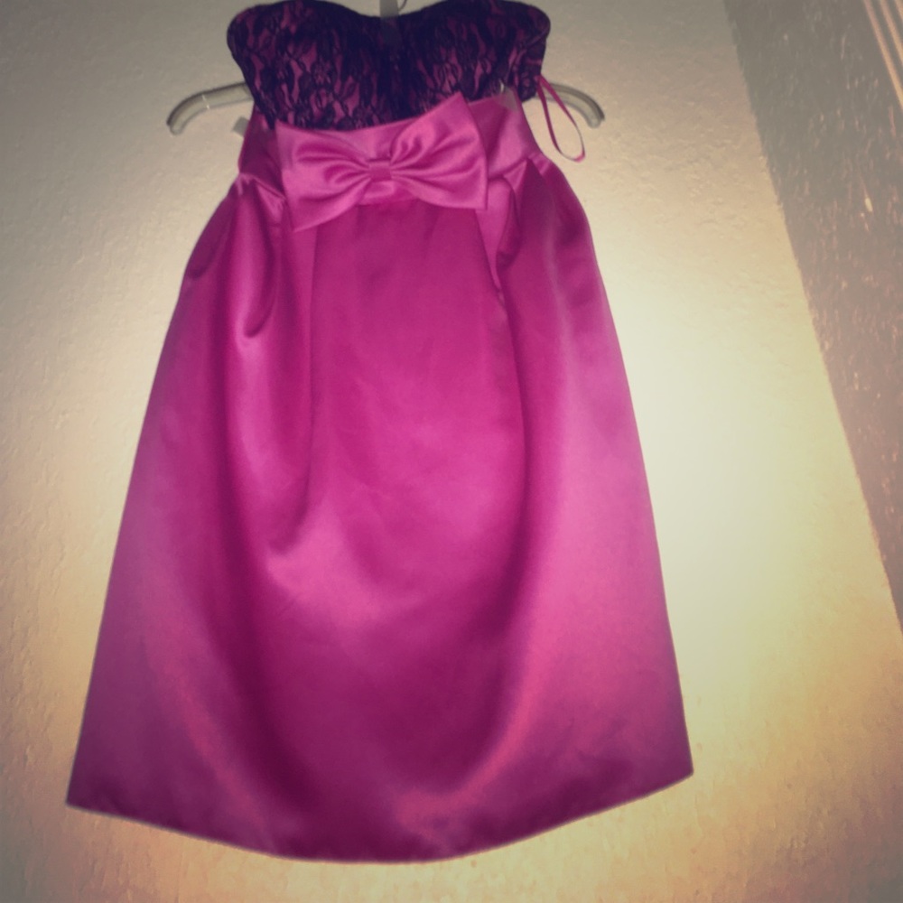 A pink with black lace dress