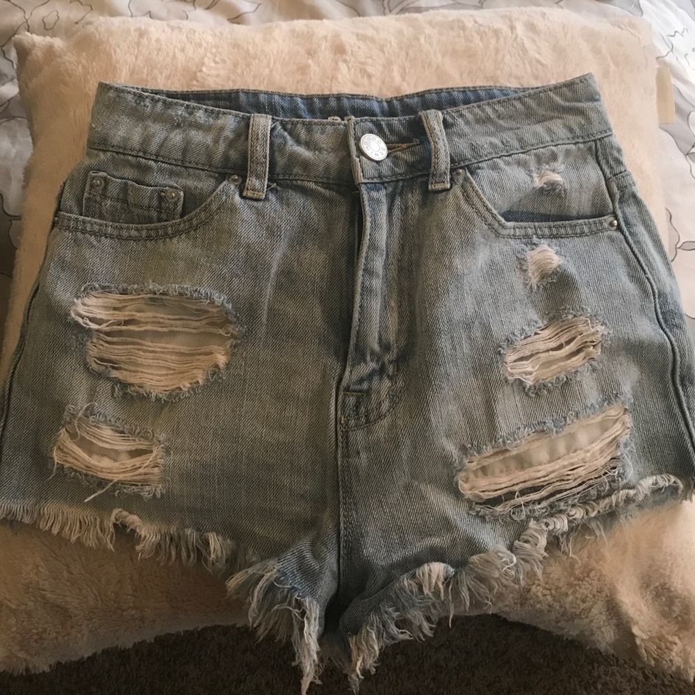 High Waisted light denim shorts with rips