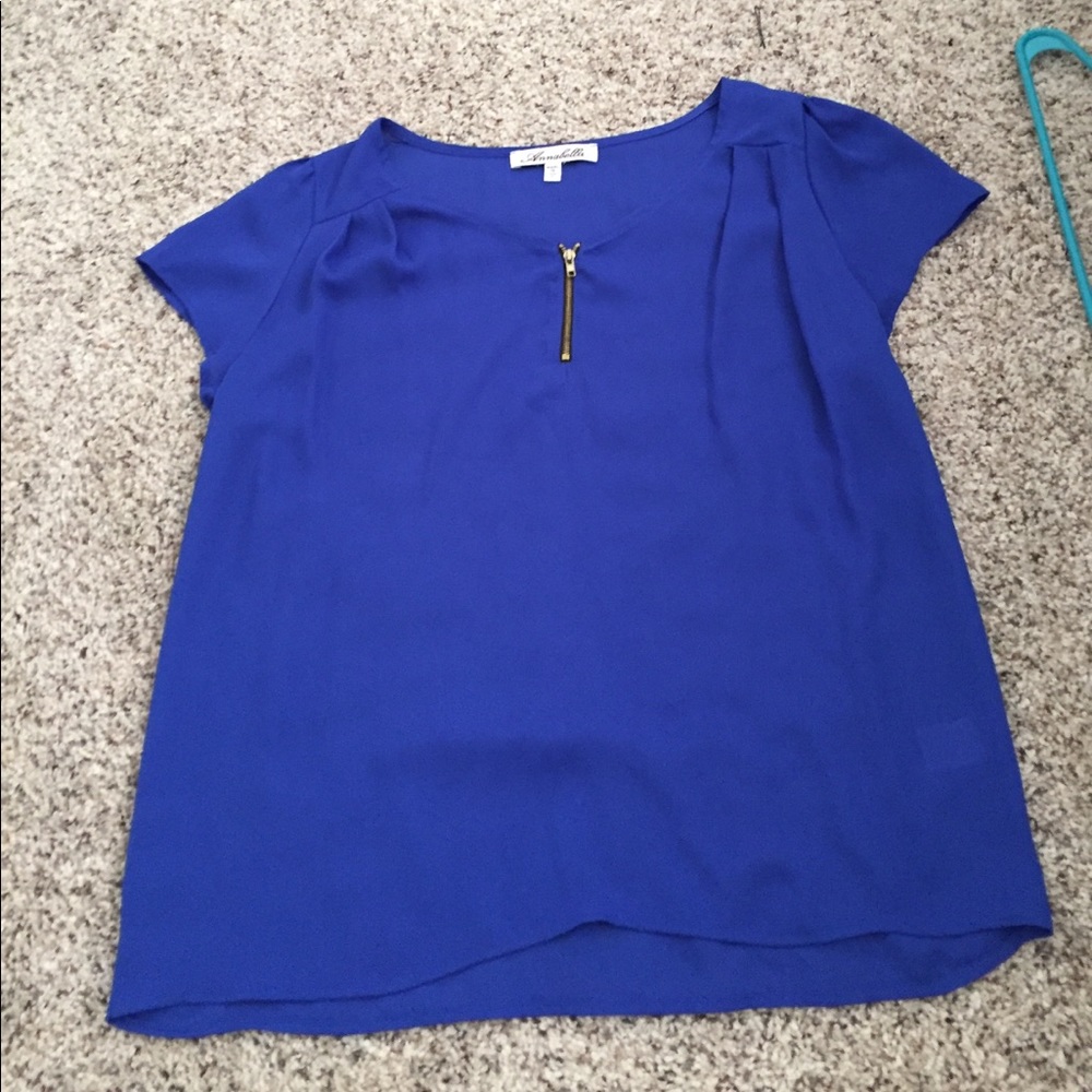 blue top with a working little zipper