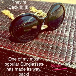 Tassel Gold frame bold black lenses