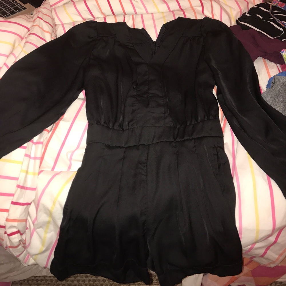 Black silk like romper new with tag