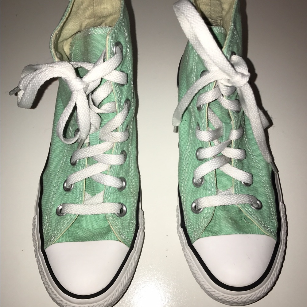 Mint green high top converse