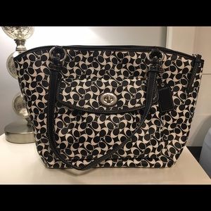 Black and white "C" Coach bag
