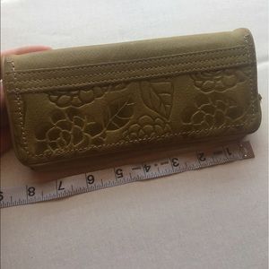Used leather green Fossil wallet.