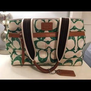 Green and white "C" Coach bag