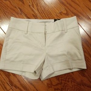 Expresss cream colored shorts. Size 4