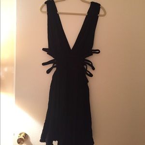 Free people Tunis dress. Open sides with straps.