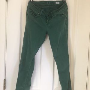 Dark green skinny pants