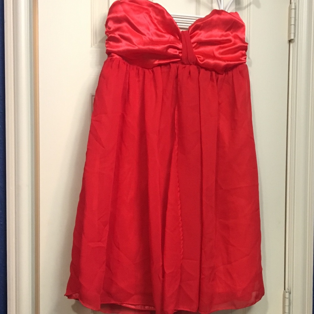 Beautiful red strapless dress, new with tags.