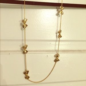 Gold bow necklace
